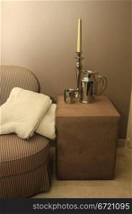 Classic chair and hocker styled with silver accessories