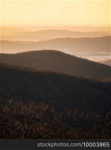 Classic golden hour glow across the Virginia piedmont and rolling hills of Shenandoah National Park.