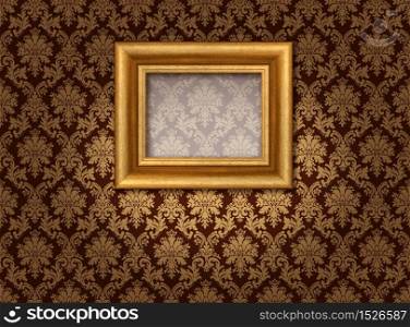 Classic golden picture frame in spotlight againgt damask style wallpaper