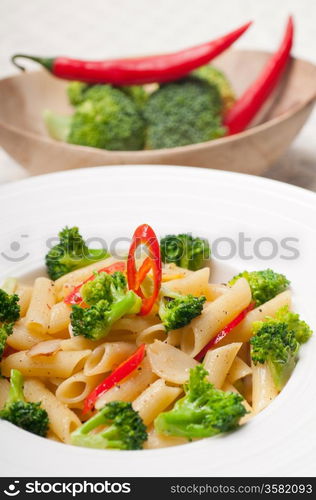 classic Italian penne pasta with broccoli and red chili pepper