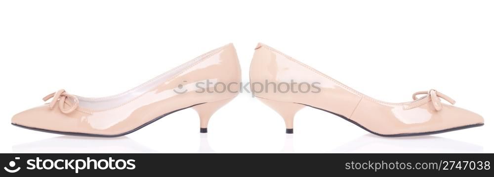 classic low heel beige woman shoes isolated on white background