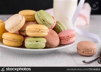 Classic Macarons with Raspberry, Coffee, Chocolate and Pistachios Filled with Cream, French Pastry