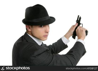 Classic mafia portrait, man with black suit and gun, isolated on white
