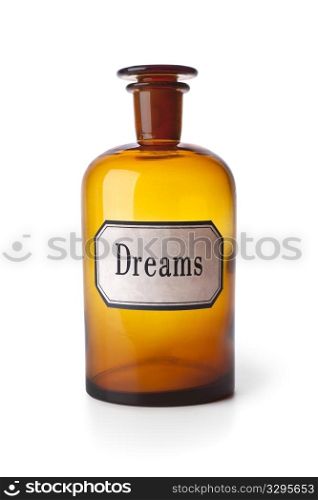 Classic pharmacy medicine bottle with the word dreams on white background