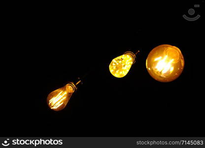 Classic retro incandescent led electric lamp on black background,Vintage light bulb