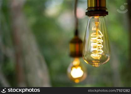 Classic retro incandescent led electric lamp on blurred background,Vintage light bulb