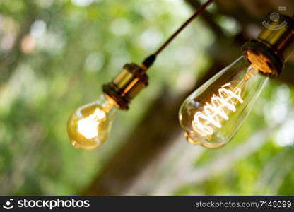 Classic retro incandescent led electric lamp on blurred background,Vintage light bulb