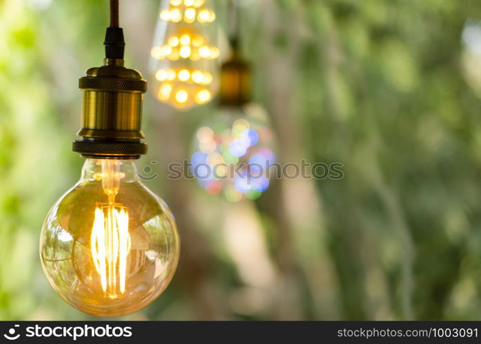 Classic retro incandescent led electric lamp on burred background, Vintage light bulb
