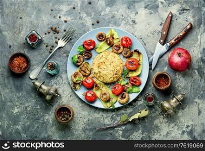 Classic Turkish pilaf with noodles.Turkish rice, grilled rice with vegetables.Arabic cuisine. Turkish rice with grilled vegetables