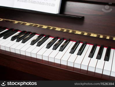 Classic upright piano keyboard black and white. Piano keyboard