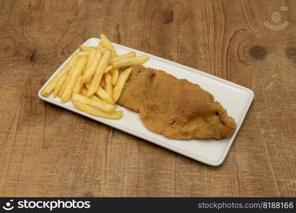 Classic veal schnitzel without more, with a side of French fries