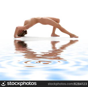 classical artistic nudity style picture of woman working out on white sand