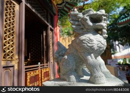 Classical Chinese lion statue in temple, Hong Kong