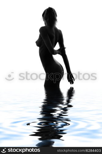 classical monochrome silhouette image of naked girl in water