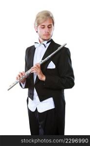 Classical music study concept. Male flutist musician performer playing flute. Young elegant man wearing tailcoat holds instrument. Male flutist wearing tailcoat holds flute