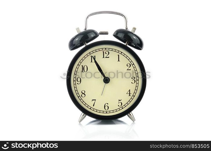 Classical retro alarm clock isolated on a white background in close-up