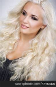 Classy Glamorous Blonde with Waved and Frizzy Hair