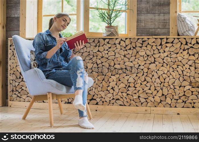 classy young woman looking book