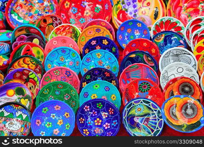 clay ceramic plates from Mexico colorful traditional handcraft