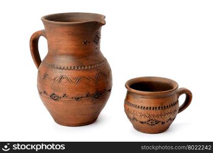 clay jug and a mug isolated on white background