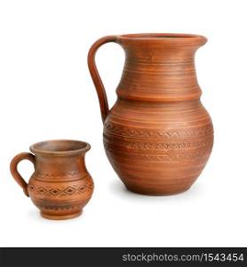 Clay jug and mug isolated on white background. Old rustic style.