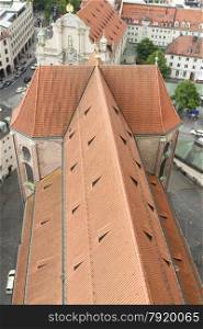 Clay orange pantile roof of St Peter?s Church, Munich. Seen from above. Bavaria, Germany, Europe.