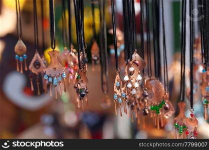 clay ornaments on the ropes at the fair
