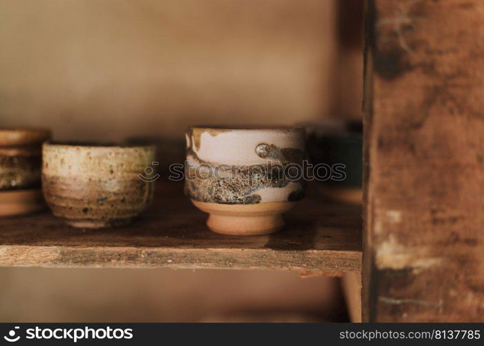 Clay pottery ceramic Products dry on shelf in workshop 