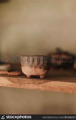 Clay pottery ceramic Products dry on shelf in workshop 