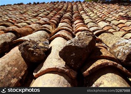 clay roof tiles old aged arabic style in Spain perspective