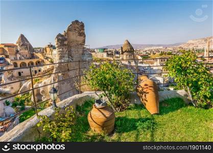 Clay vases in cave hotel with the view on Goreme, Cappadocia. Clay vases in Goreme