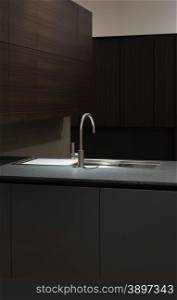 Clean and Minimalist Kithen Cabinets and Worktop with Stainless Steel Kitchen Sink