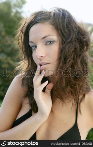 Clean beautiful brunette blue eyes woman outdoor portrait