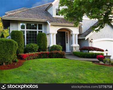 Clean exterior and landscape of residential home
