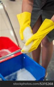 Cleaning concept photo. Cleaning concept. Closeup photo of woman cleaning shopping center