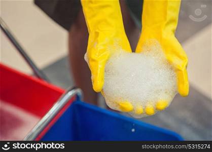 Cleaning concept photo. Cleaning concept. Closeup photo of woman cleaning shopping center