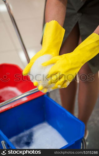 Cleaning concept photo. Cleaning concept. Closeup photo of woman cleaning shopping center