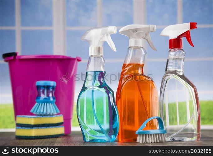 Cleaning supplies and window background. Group of assorted cleaning and window background