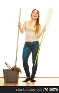 Cleanup housework concept. Funny cleaning girl young woman mopping floor, holding two mops new and old white background