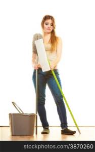 Cleanup housework concept. Tired cleaning lady young woman mopping floor, holding two mops new and old white background