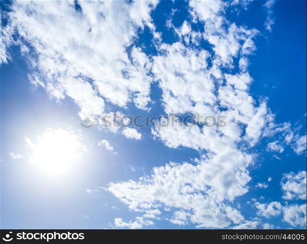 clear blue sky covered with white clouds