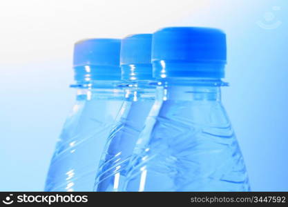 clear cold blue water in bottle