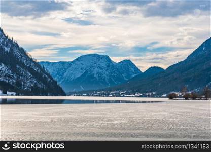 Clear Cold Landscape with blue sky at Grundlsee, Austria, winter, frozen lake.