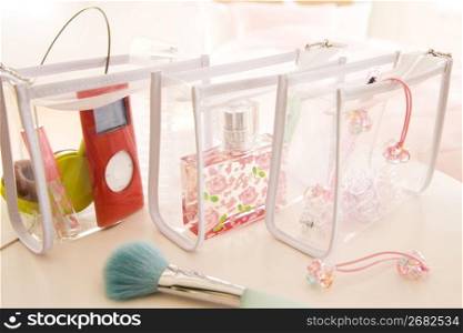 Clear cosmetic bags with objects inside
