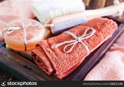 clear towels and aroma soap in the wooden box