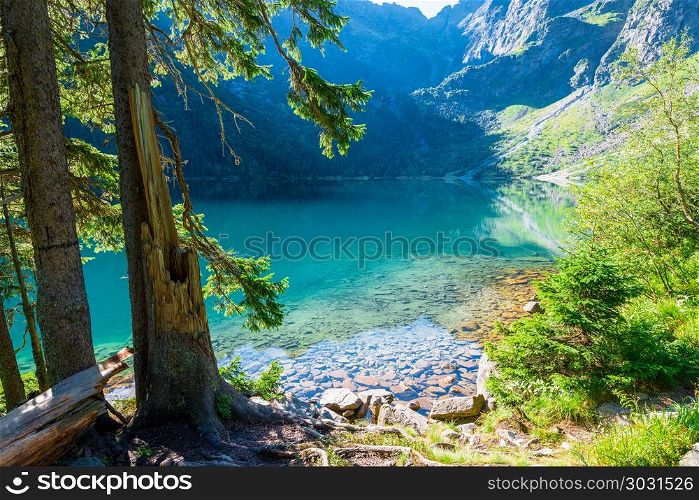clear turquoise waters of Lake Morskie Oko in the Tatra Mountain. clear turquoise waters of Lake Morskie Oko in the Tatra Mountains in Poland