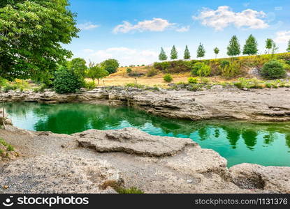 Clear water in the canyon of waterfall, Montenegro. Waterfall in Montenegro