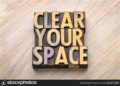 clear your space - word abstract in wood type. clear your space - word abstract in vintage letterpress wood type, declutter concept