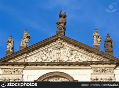 Clementinum - Sculpture over the entrance to historical complex of buildings in Prague, Czech Republic
