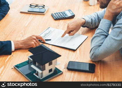 Client and real estate agent review loan contract, discussing term, interest rate, and property ownership. Analyze legal document and thoroughly read agreement before making decision. Entity. Client and real estate agent review loan contract and discussing term. Entity